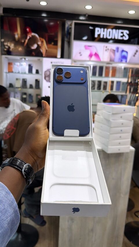 Boxed blue iPhone at the Valmont store